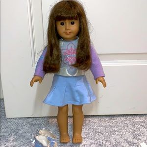 American girl doll with 2 outfits all sold as a bundle